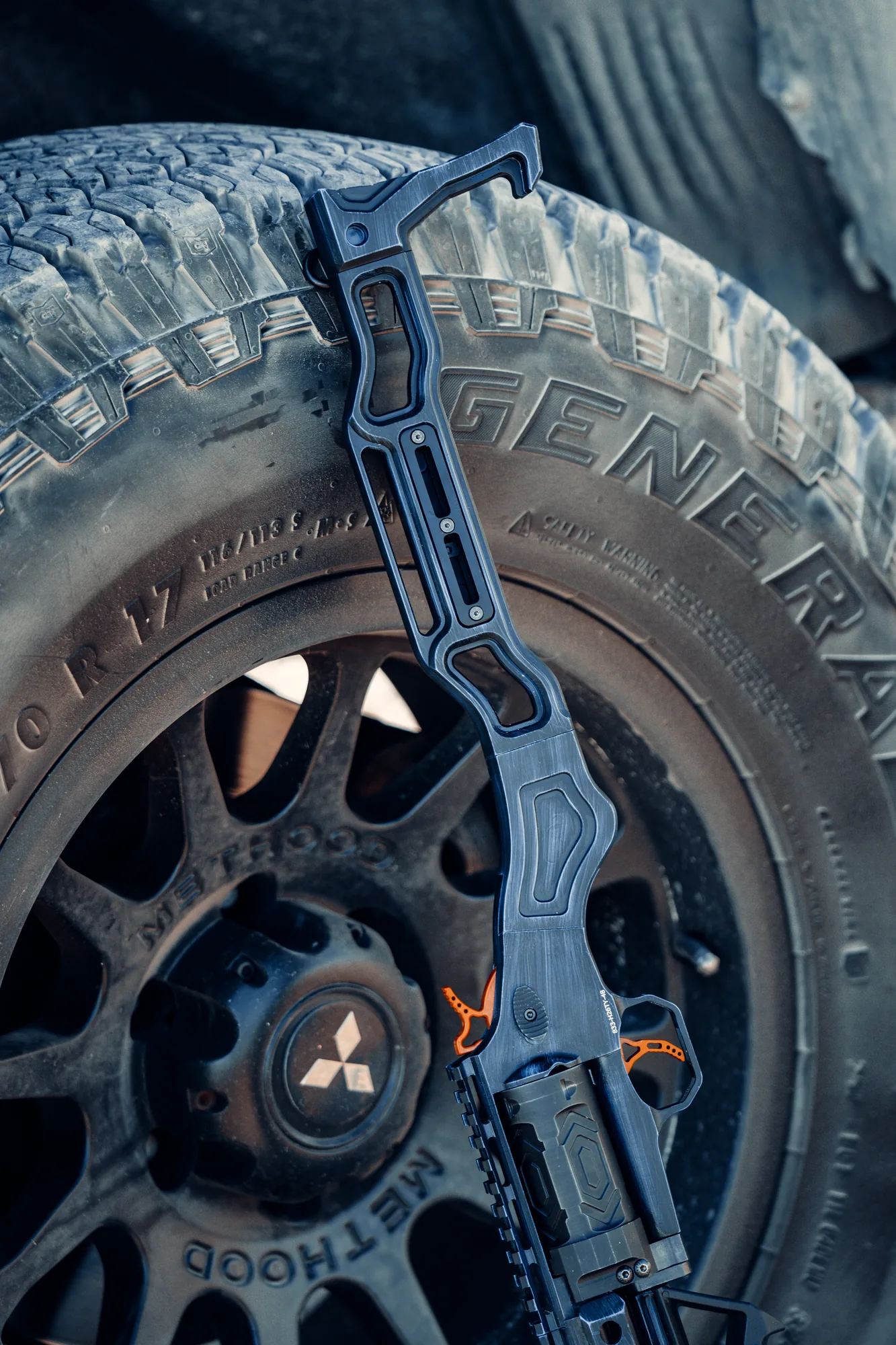 A TR410 against the tread of an off-road tyre